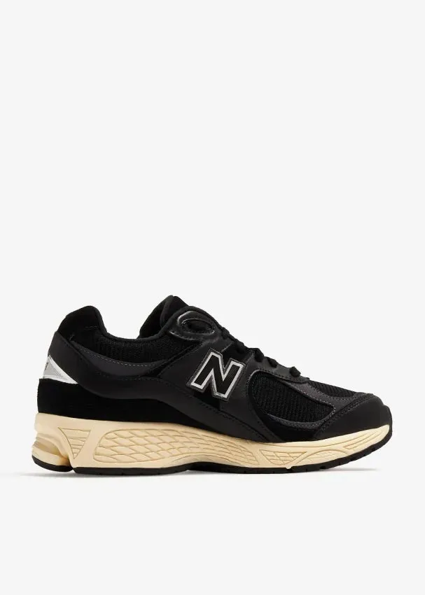New Balance 1000 Real Pink New Balance 2002R Black